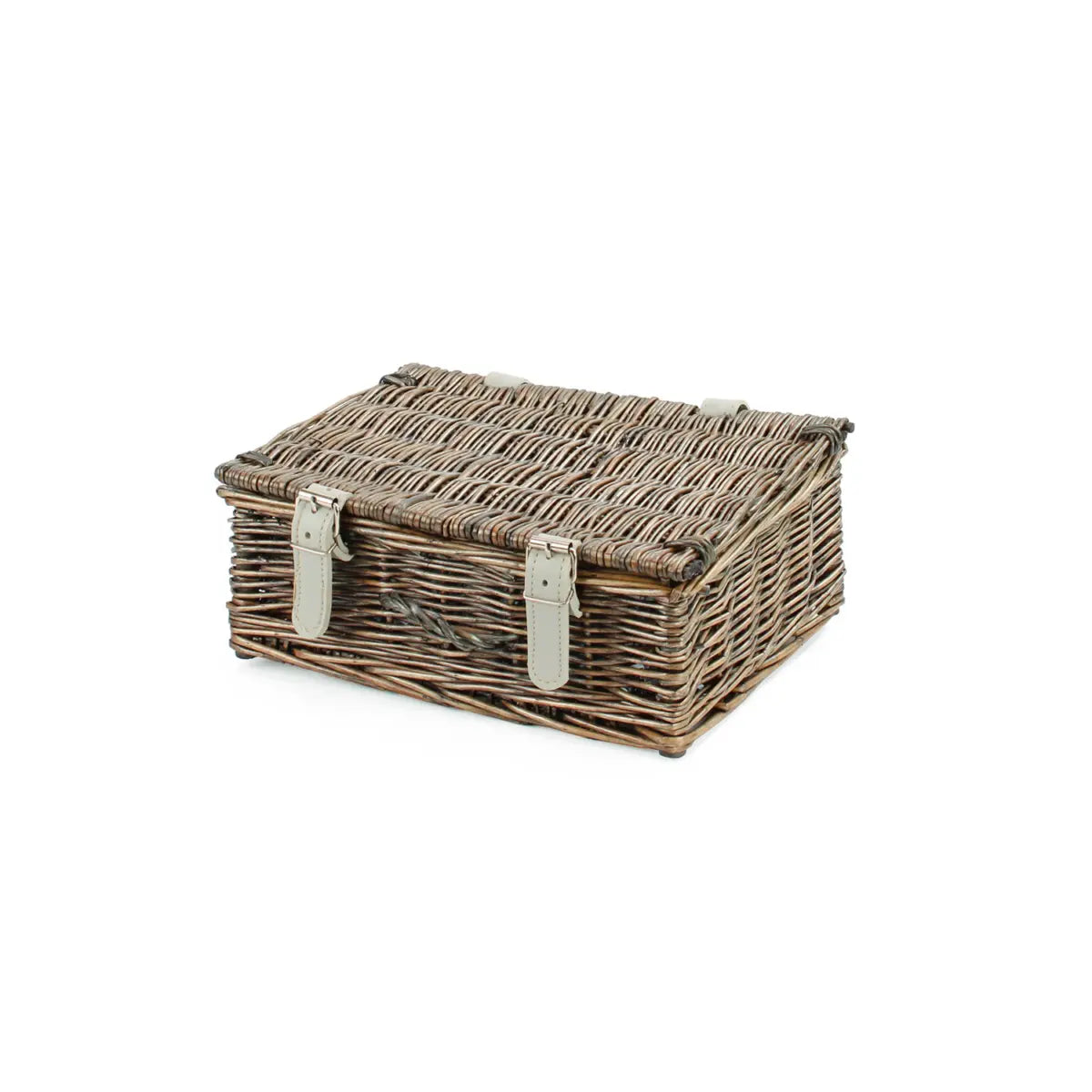 Wicker picnic basket with a lid on a white background